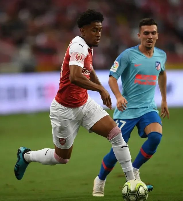 Framed Print : Reiss Nelson vs. Joaquin Munoz: Clash between Arsenal and Atletico Madrid in 2018 International Champions Cup