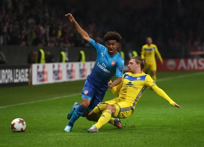 Framed Print : Reiss Nelson vs Maksim Volodko: A Europa League Showdown - Arsenal FC vs BATE Borisov