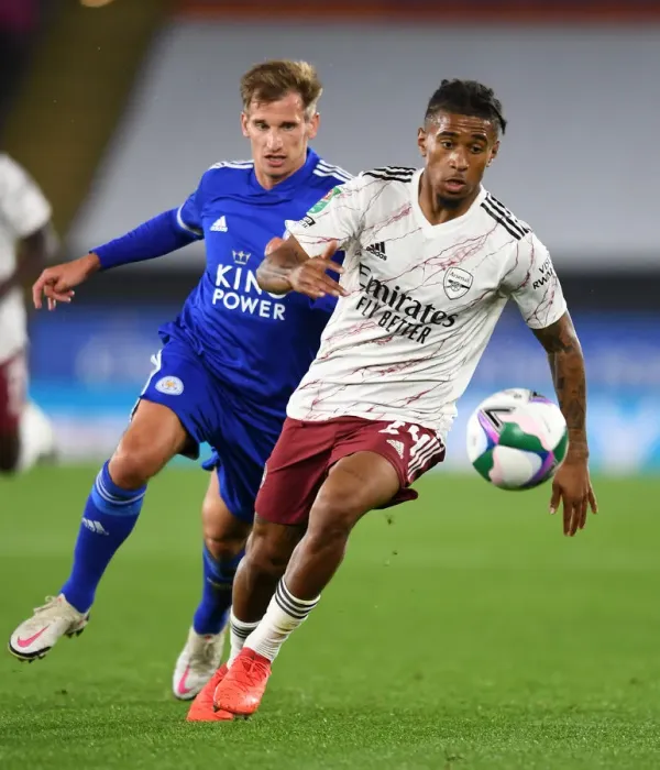 Framed Print : Reiss Nelson vs Marc Albrighton: Battle at The King Power Stadium - Leicester City vs Arsenal Carabao Cup Clash