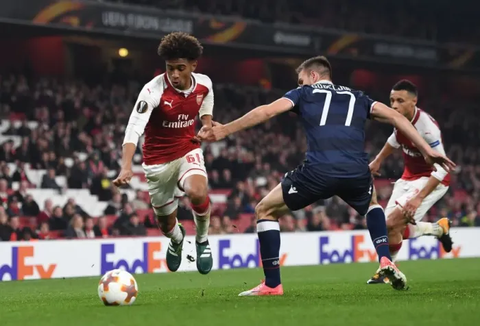 Framed Print : Reiss Nelson vs Marko Gobeljic: Battle at Emirates Stadium - Arsenal FC vs Crvena Zvezda, UEFA Europa League Framed Print : Reiss Nelson vs Marko Gobeljic: Battle at Emirates Stadium - Arsenal FC vs Crvena Zvezda, UEFA Europa League