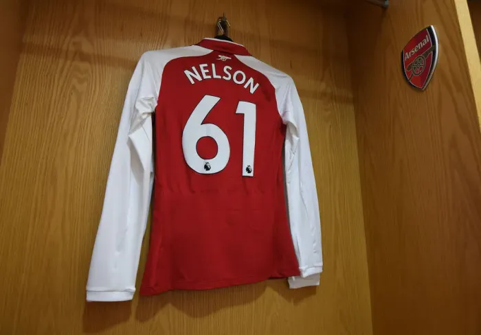 Framed Print : Reiss Nelson's Arsenal Shirt: Pre-Match Focus at Emirates Stadium (Arsenal vs Southampton, Premier League) Framed Print : Reiss Nelson's Arsenal Shirt: Pre-Match Focus at Emirates Stadium (Arsenal vs Southampton, Premier League)