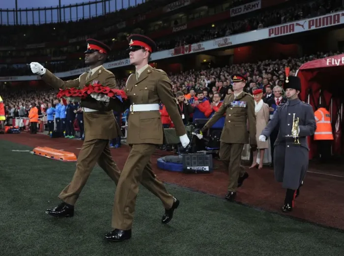 Framed Print : Remembrance Sunday at Emirates Stadium: Soldiers Honor the Fallen Before Arsenal vs. Tottenham Match, 2015