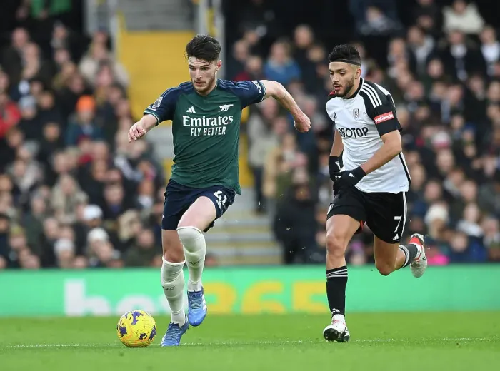 Framed Print : Rice vs. Jimenez: Intense Clash in Fulham vs. Arsenal Premier League Showdown (2023-24)