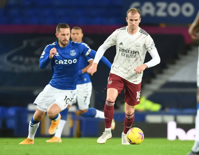 Framed Print : Rising Above: Rob Holding Battles Past Gylfi Sigurdsson in Everton vs Arsenal Premier League Clash Framed Print : Rising Above: Rob Holding Battles Past Gylfi Sigurdsson in Everton vs Arsenal Premier League Clash