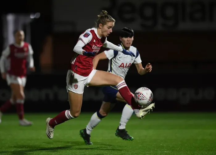 Framed Print : Rivalry Unleashed: Miedema vs. Neville in Empty Arsenal Stands - FA Cup Clash Between Arsenal and Tottenham Women Framed Print : Rivalry Unleashed: Miedema vs. Neville in Empty Arsenal Stands - FA Cup Clash Between Arsenal and Tottenham Women
