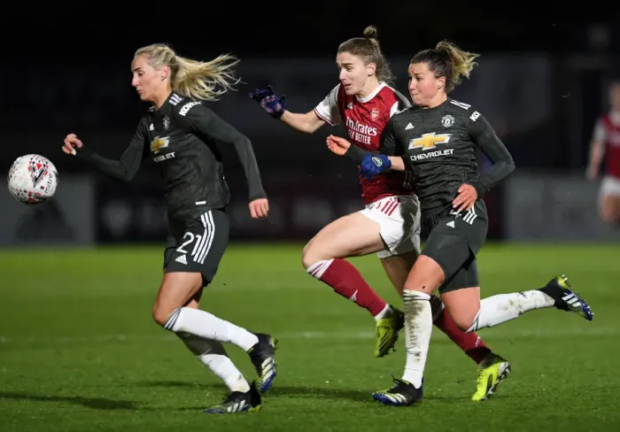 Framed Print : Riveting Rivalry: Arsenal Women vs Manchester United Women at Empty Meadow Park Amidst Pandemic Restrictions