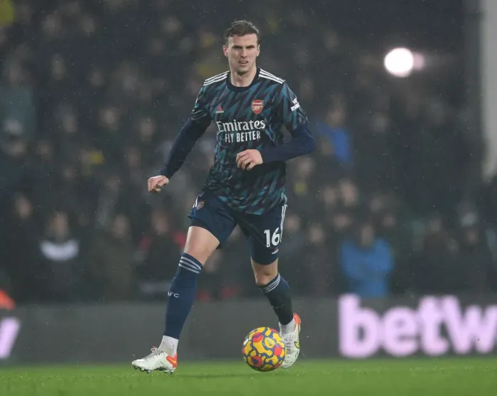 Framed Print : Rob Holding in Action: Arsenal's Defensive Battle at Norwich City, Premier League 2021-22
