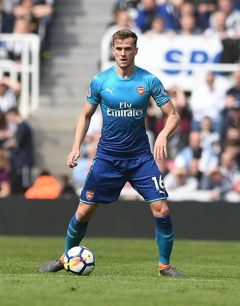 Rob Holding in Action: Arsenal's Defensive Hero at St. James Park (Newcastle United vs Arsenal, Premier League 2017-18)