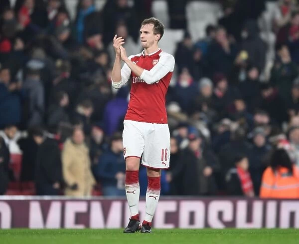 Rob Holding Celebrates with Arsenal Fans after Carabao Cup Quarterfinal Victory over West Ham United