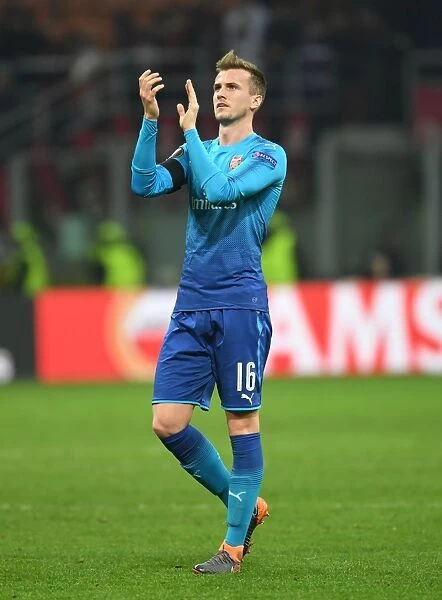 Rob Holding Celebrates with Arsenal Fans after Europa League Clash with AC Milan