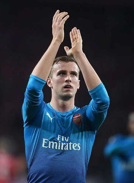 Rob Holding Celebrates with Arsenal Fans after UEFA Europa League Win against 1. FC Koeln