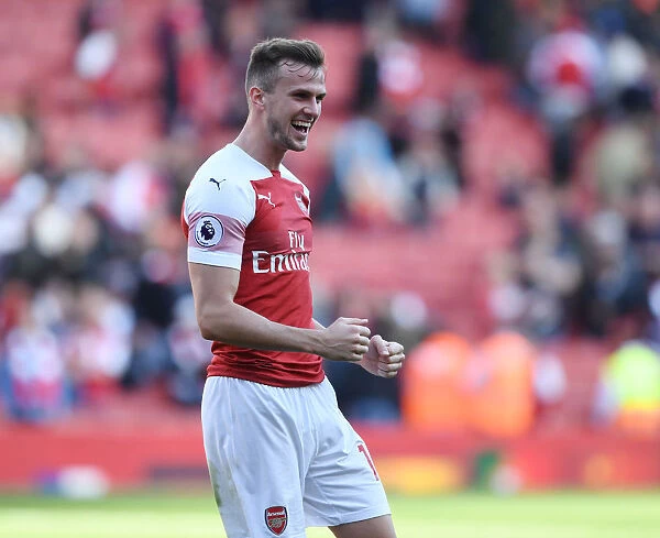 Rob Holding Celebrates Arsenal's Victory Over Watford in the Premier League