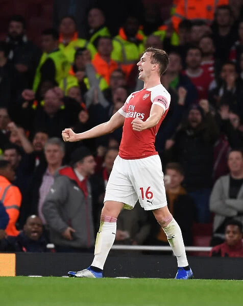 Rob Holding Celebrates Arsenal's Win Over Tottenham Hotspur in the Premier League