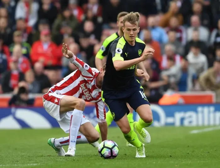 Framed Print : Rob Holding Outmuscles Peter Crouch: A Battle in the Premier League Clash Between Stoke City and Arsenal Framed Print : Rob Holding Outmuscles Peter Crouch: A Battle in the Premier League Clash Between Stoke City and Arsenal