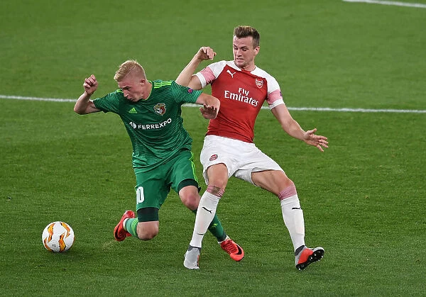 Rob Holding Stops Vladyslav Kulach in Arsenal's Europa League Clash