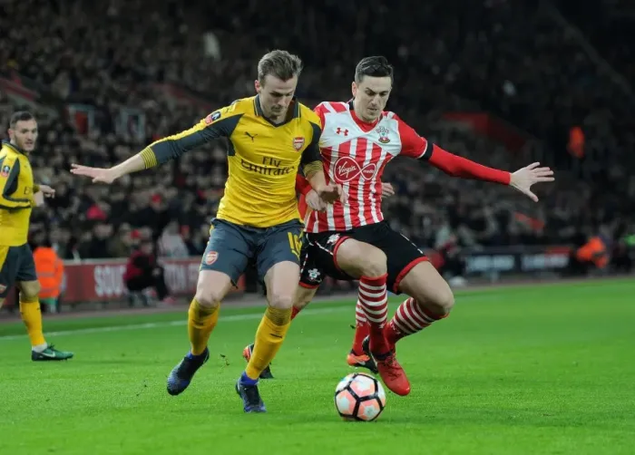 Framed Print : Rob Holding vs Florin Gardos: Clash at the FA Cup Fourth Round - Southampton vs Arsenal Framed Print : Rob Holding vs Florin Gardos: Clash at the FA Cup Fourth Round - Southampton vs Arsenal