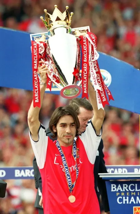 Framed Print : Robert Pires lifts the F. A. Barclaycard Premiership Trophy