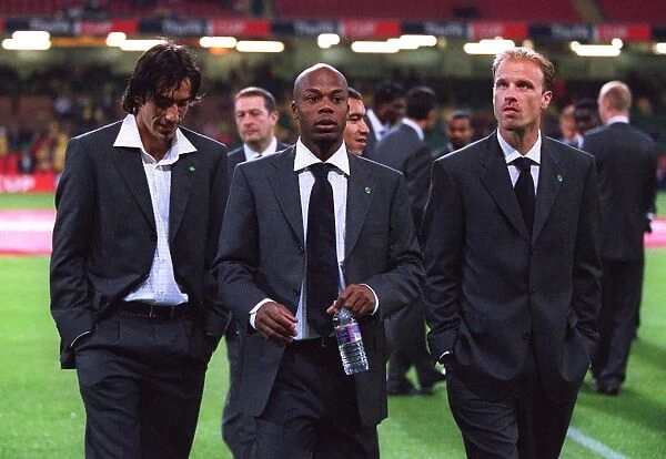 Robert Pires, Sylvain Wiltord and Dennis Bergkamp (Arsenal) in their Cup Final Suits before the matc