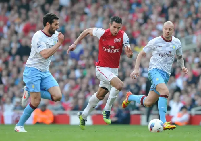 Framed Print : Robin van Persie (Arsenal) Carlos Cuellar and Alan Hutton (Villa). Arsenal 3: 0 Aston Villa Framed Print : Robin van Persie (Arsenal) Carlos Cuellar and Alan Hutton (Villa). Arsenal 3: 0 Aston Villa