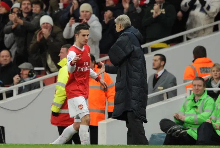 Framed Print : Robin van Persie (Arsenal) is congratulated by Manager Arsene Wenger on his hat trick as he is subbed. Arsenal 3: 0 Wigan Athletic. Barclays Premier League. Emirates Stadium, 22 / 1 / 11. Credit : Arsenal Football Club / Framed Print : Robin van Persie (Arsenal) is congratulated by Manager Arsene Wenger on his hat trick as he is subbed. Arsenal 3: 0 Wigan Athletic. Barclays Premier League. Emirates Stadium, 22 / 1 / 11. Credit : Arsenal Football Club /