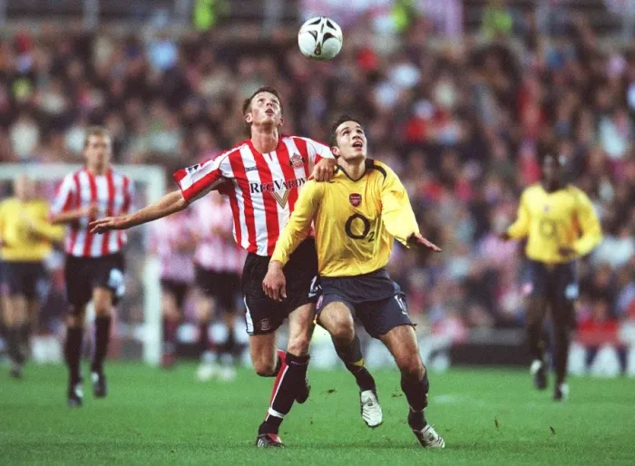 Framed Print : Robin van Persie (Arsenal) Danny Collins (Sunderland). Sunderland 0: 3 Arsenal Framed Print : Robin van Persie (Arsenal) Danny Collins (Sunderland). Sunderland 0: 3 Arsenal