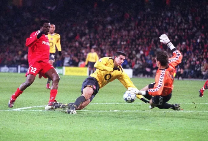 Framed Print : Robin van Persie (Arsenal) is fouled by Armand Orman (Thun)