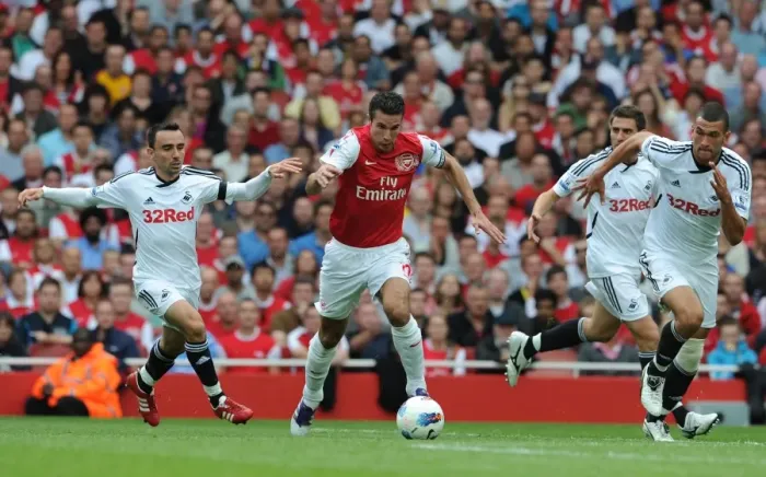 Framed Print : Robin van Persie (Arsenal) Leon Britton and Steven Caulker (Swansea). Arsenal 1: 0 Swansea City Framed Print : Robin van Persie (Arsenal) Leon Britton and Steven Caulker (Swansea). Arsenal 1: 0 Swansea City
