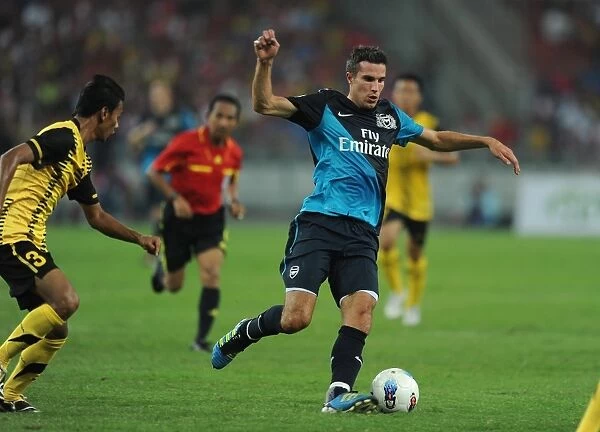 Robin van Persie (Arsenal) Mohd Ismail (Malaysia). Malaysia XI 0: 4 Arsenal