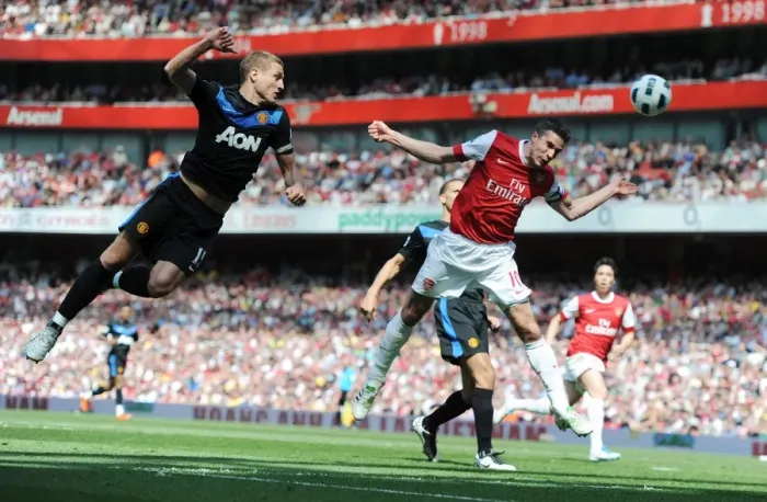 Framed Print : Robin van Persie (Arsenal) Nemanja Vidic (Man United). Arsenal 1: 0 Manchester United