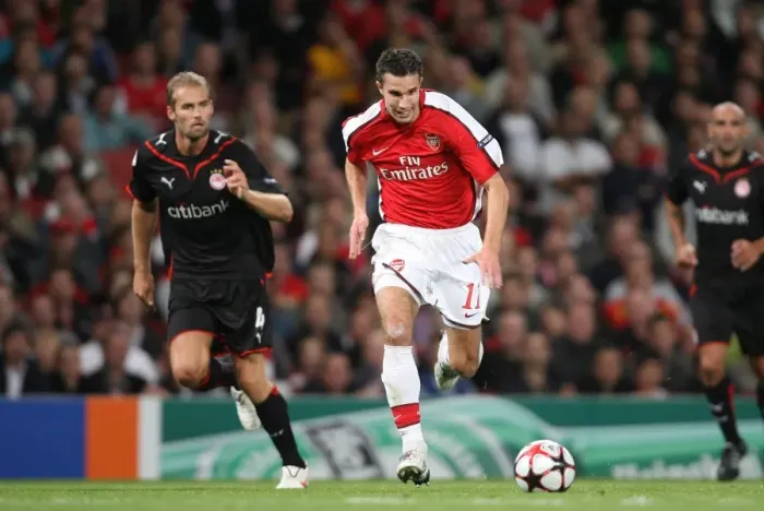 Framed Print : Robin van Persie (Arsenal) Olaf Mellberg (Olympiacos) Framed Print : Robin van Persie (Arsenal) Olaf Mellberg (Olympiacos)