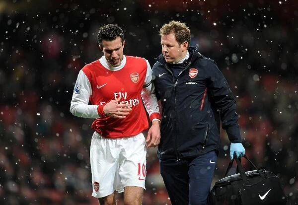 Robin van Persie (Arsenal) with Physio Colin Lewin. Arsenal 2: 0 Wigan Athletic