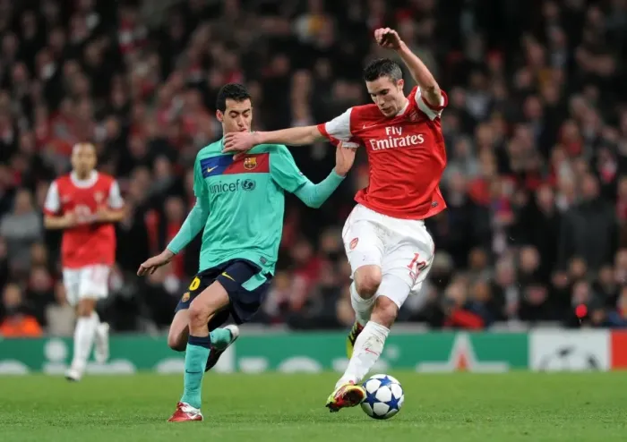 Framed Print : Robin van Persie (Arsenal) Sergio Busquets (Barcelona). Arsenal 2: 1 Barcelona Framed Print : Robin van Persie (Arsenal) Sergio Busquets (Barcelona). Arsenal 2: 1 Barcelona