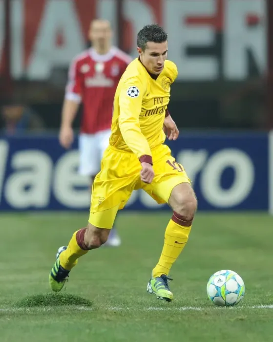 Framed Print : Robin van Persie Battles Uneven Turf in AC Milan vs. Arsenal UEFA Champions League Clash Framed Print : Robin van Persie Battles Uneven Turf in AC Milan vs. Arsenal UEFA Champions League Clash