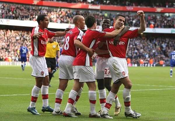 Robin van Persie celebrates scoring the 2nd Arsenal