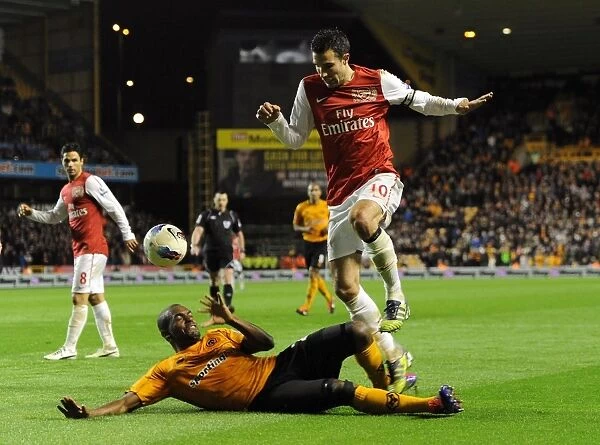 Robin van Persie Leaps Past Ronald Zubar: Wolverhampton Wanderers vs. Arsenal, Premier League, 2011-2012