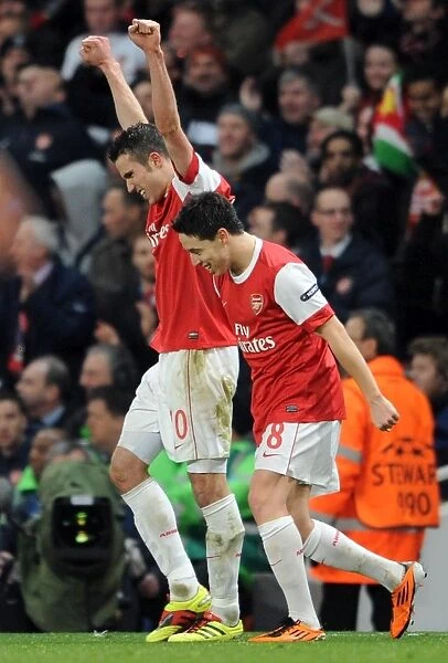 Robin van Persie and Samir Nasri: Arsenal's Unforgettable Goal Celebration vs. Barcelona in the UEFA Champions League (1st Leg, Arsenal 2:1)