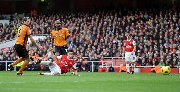 Robin van Persie scores his and Arsenals 1st goal under pressure from Richard Stearman