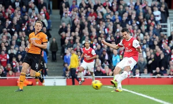 Robin van Persie scores his and Arsenals 2nd goal under pressure from Christophe Berra