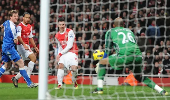 Framed Print : Robin van Persie scores his and Arsenals 3rd goal past Ali Al Habsi (Wigan) Framed Print : Robin van Persie scores his and Arsenals 3rd goal past Ali Al Habsi (Wigan)