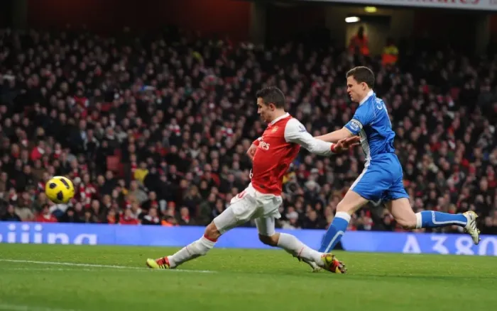 Framed Print : Robin van Persie Scores Stunner: Arsenal Crush Wigan 3-0 Framed Print : Robin van Persie Scores Stunner: Arsenal Crush Wigan 3-0