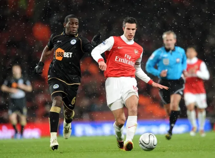 Framed Print : Robin van Persie Scores Twice: Arsenal Defeats Wigan Athletic 2-0 in Carling Cup Quarterfinals Framed Print : Robin van Persie Scores Twice: Arsenal Defeats Wigan Athletic 2-0 in Carling Cup Quarterfinals