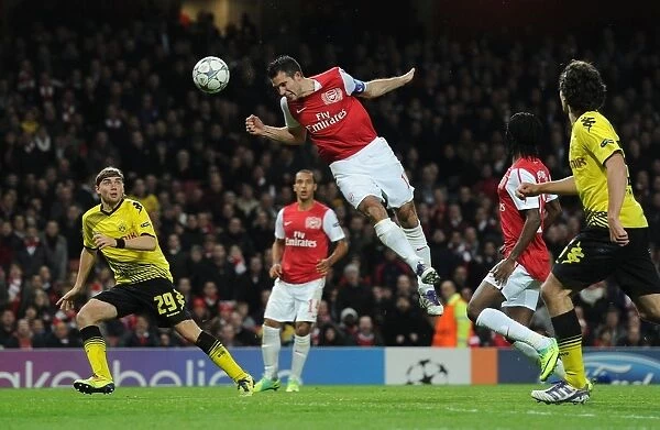 Robin van Persie Soars Above Dortmund: Arsenal's First Goal in Champions League Clash (2011)