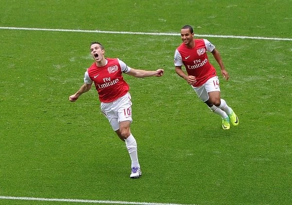 Robin van Persie and Theo Walcott Celebrate Arsenal's First Goal Against Sunderland in the Premier League: Arsenal 2-1