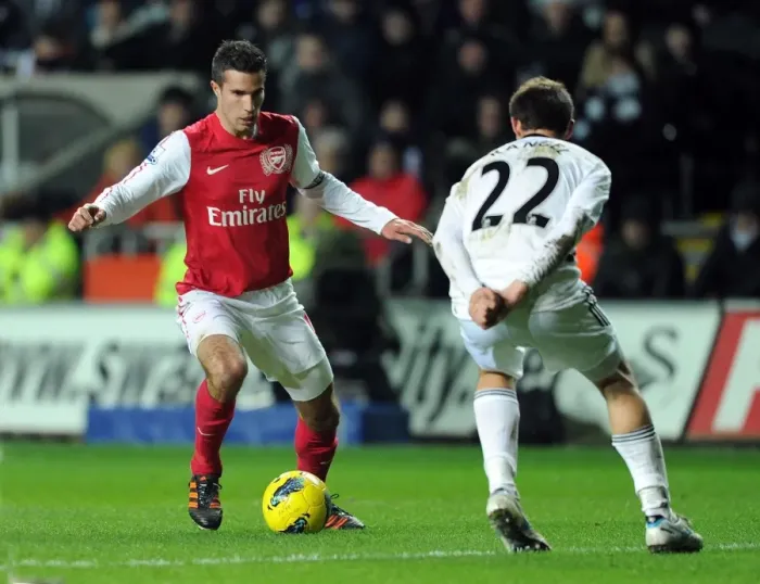 Framed Print : Robin van Persie vs. Angel Rangel: Intense Battle in Swansea City vs. Arsenal (2011-12)