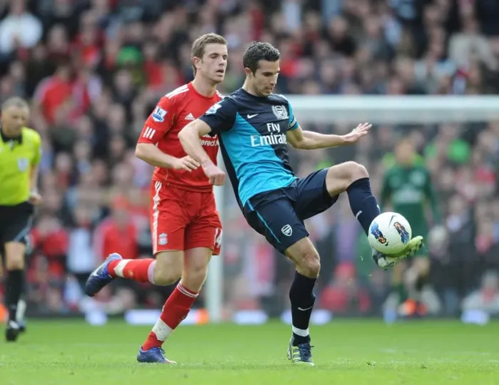 Framed Print : Robin van Persie vs. Jordan Henderson: Intense Rivalry at Anfield - Liverpool vs. Arsenal, Premier League 2011-12 Framed Print : Robin van Persie vs. Jordan Henderson: Intense Rivalry at Anfield - Liverpool vs. Arsenal, Premier League 2011-12