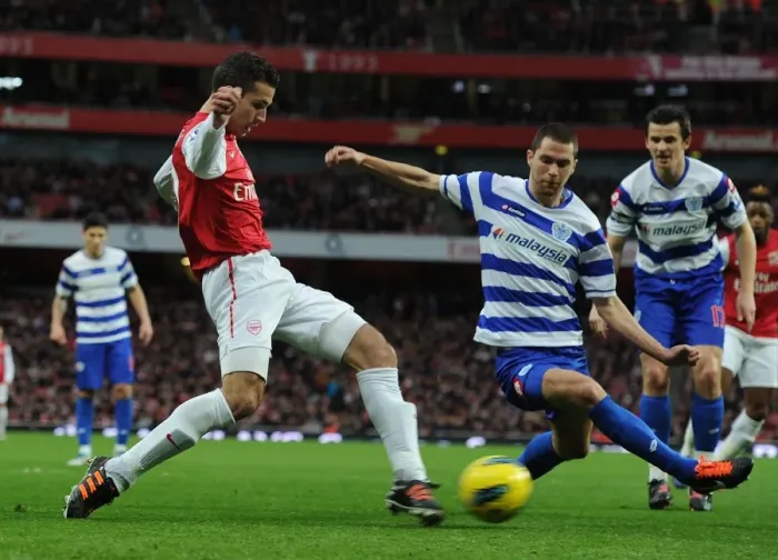 Framed Print : Robin van Persie vs. Matthew Connolly: Arsenal vs. Queens Park Rangers, Premier League, 2011-12 Framed Print : Robin van Persie vs. Matthew Connolly: Arsenal vs. Queens Park Rangers, Premier League, 2011-12