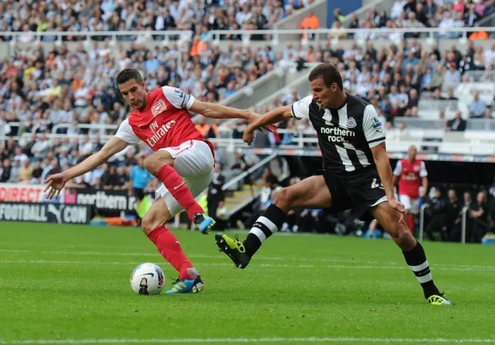 Framed Print : Robin van Persie vs. Ryan Taylor: Clash at St. James Park (Newcastle United vs. Arsenal, 2011-12)