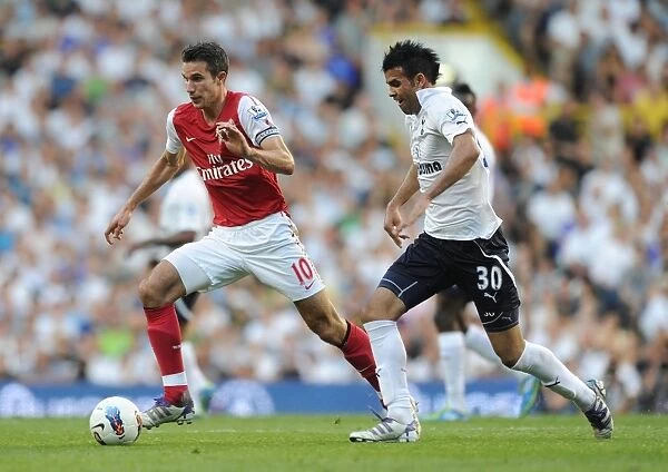 Robin van Persie vs. Sandro: A Pivotal Moment in the 2:1 Tottenham Hotspur Victory over Arsenal in the Premier League, October 2011