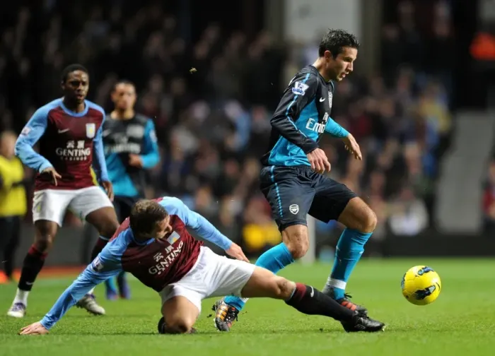 Framed Print : Robin van Persie vs. Stephen Warnock: A Battle in the 2011-12 Aston Villa vs. Arsenal Premier League Match