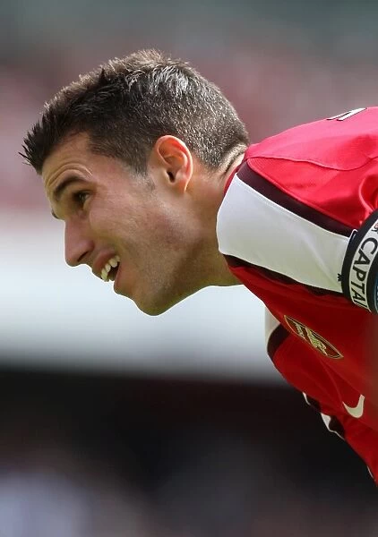 Robin van Persie's Brilliant Performance: Arsenal's 4-1 Victory Over Portsmouth in the Premier League